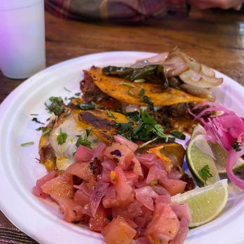 Tacompadre signature dishes BurritosLoaded FriesQuesotacos